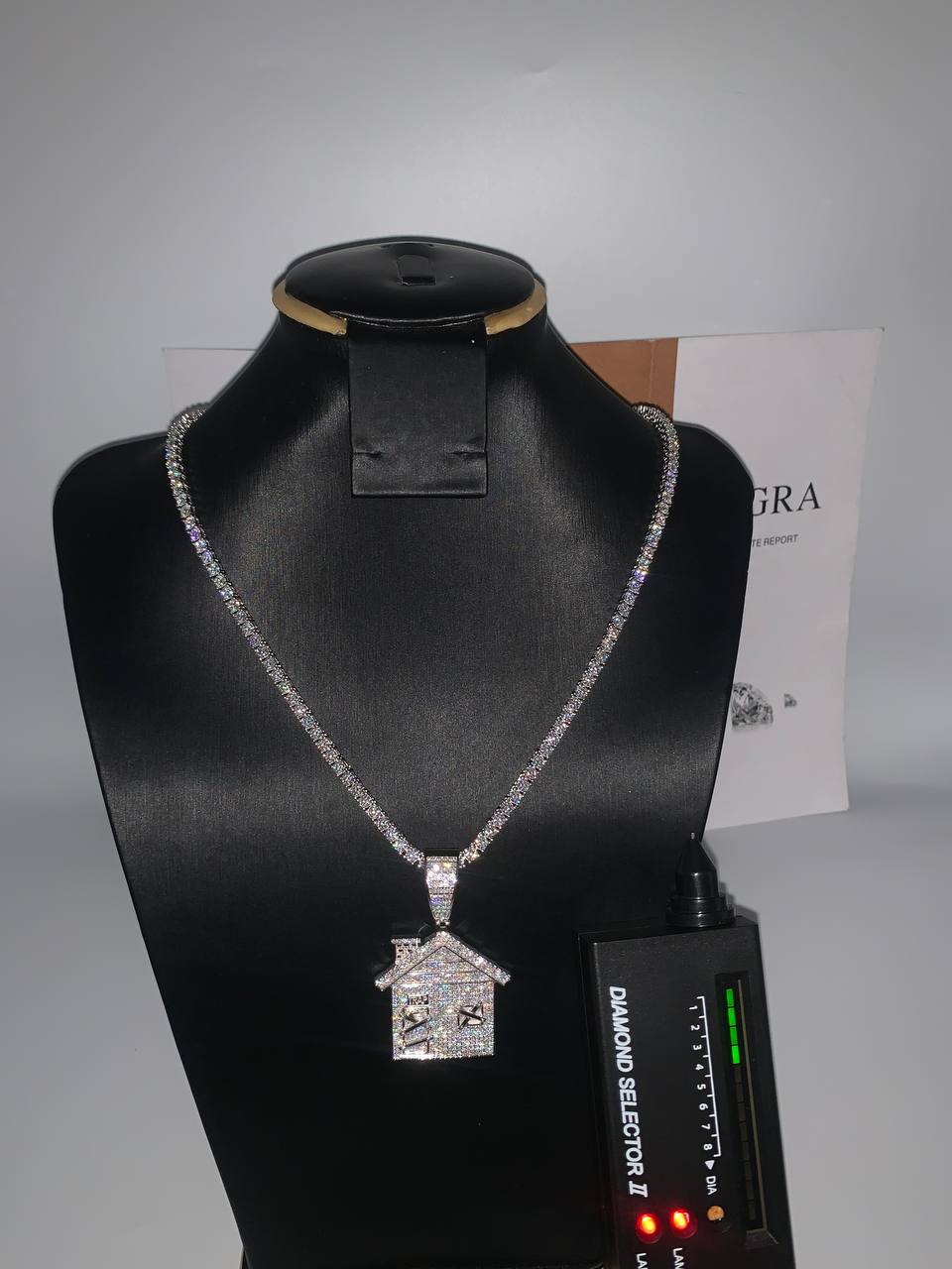 Iced-Out Trap House Pendant on a Neck Chain